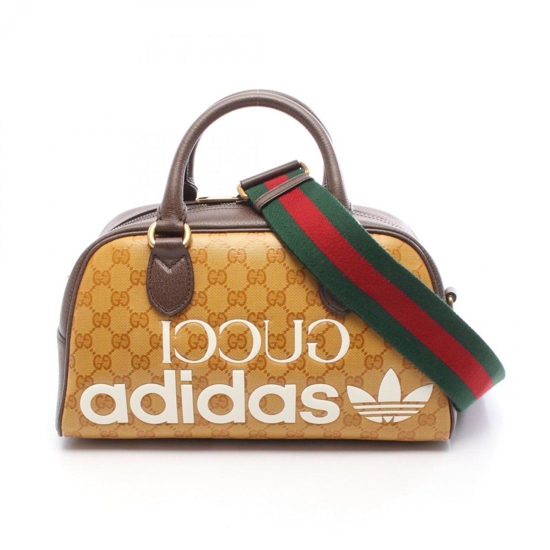 Gucci x adidas Mini Duffle Bag with GG Crystals, Coated Canvas and Leather, Brown, Women's, 702397: --- Catalog ---Category: SizeSize (HxWxD): 17cm x 32cm x 15cm / 6.69'' x 12.59'' x 5.9''Category: DesignType: HandbagColor: BrownGender: WomenMaterial: PVC , Coated canvas , Leather Category: GeneralM