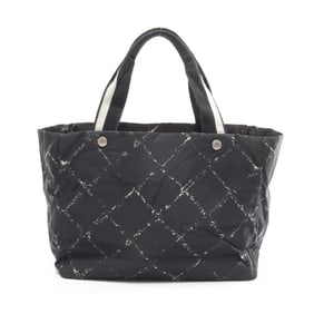 Chanel (formerly the Travel Line) tote bag in nylon canvas, available black and white.