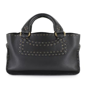 Celine Boogie Bag handbag in black leather with studs and gold hardware.