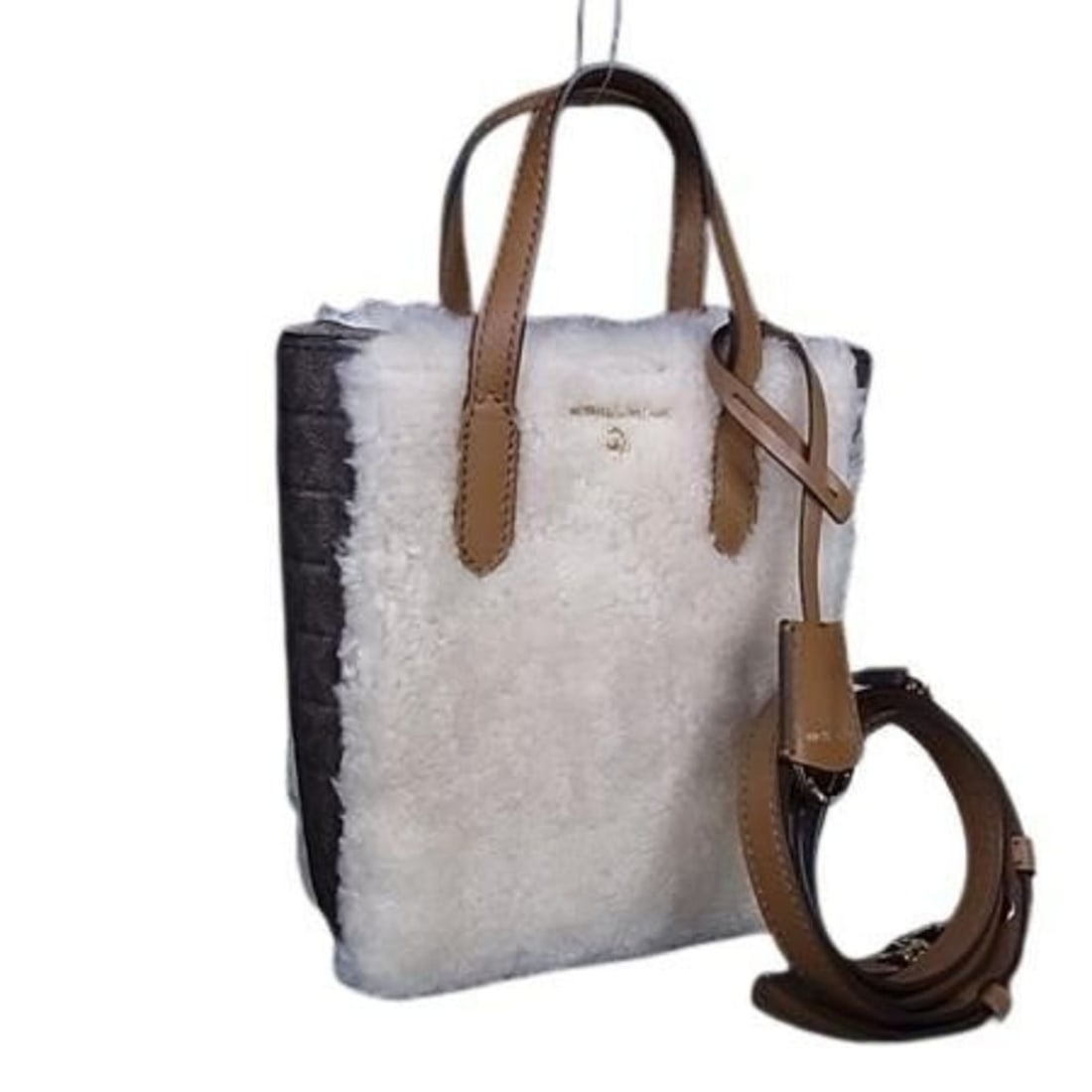 MICHAEL KORS Women's Ivory and Brown Boa Leather Handbag in MK Pattern: --- Catalog ---Category: SizeSize (HxWxD): 19cm x 14.5cm x 4cm / 7.48'' x 5.7'' x 1.57''Category: DesignType: Handbag, Shoulder bag, Tote bagColor: Brown, IvoryGender: Men,WomenClosure: MagnetMaterial