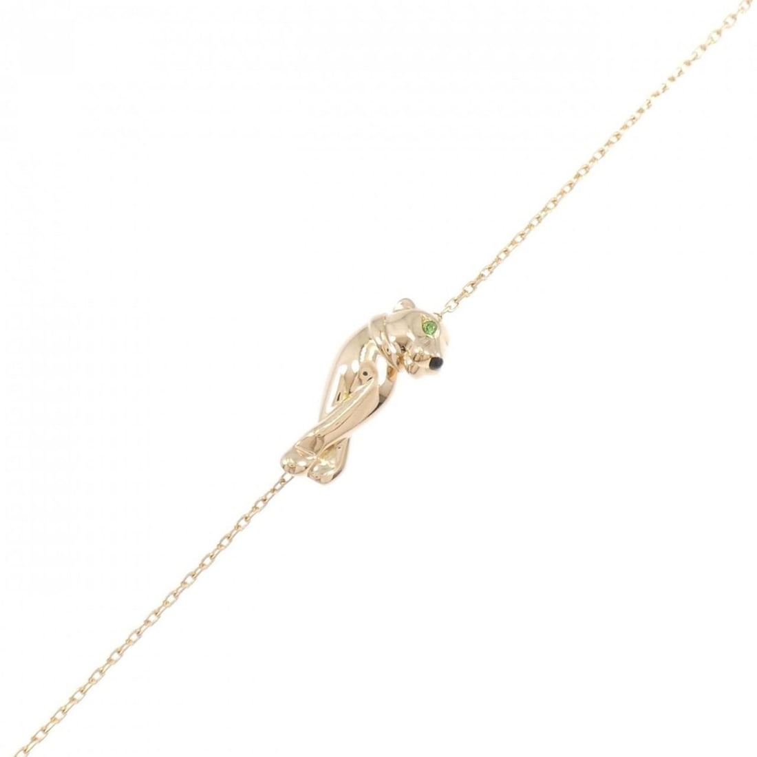 Cartier Panthère Bracelet: --- Catalog ---Category: SizeLength: 15cm - 16cm / 5.9'' - 6.29''Category: DesignType: Charm braceletStone: GarnetGender: WomenMaterial: Pink gold (18K)Category: GeneralMPN: B60434Brand: Cartier--- It