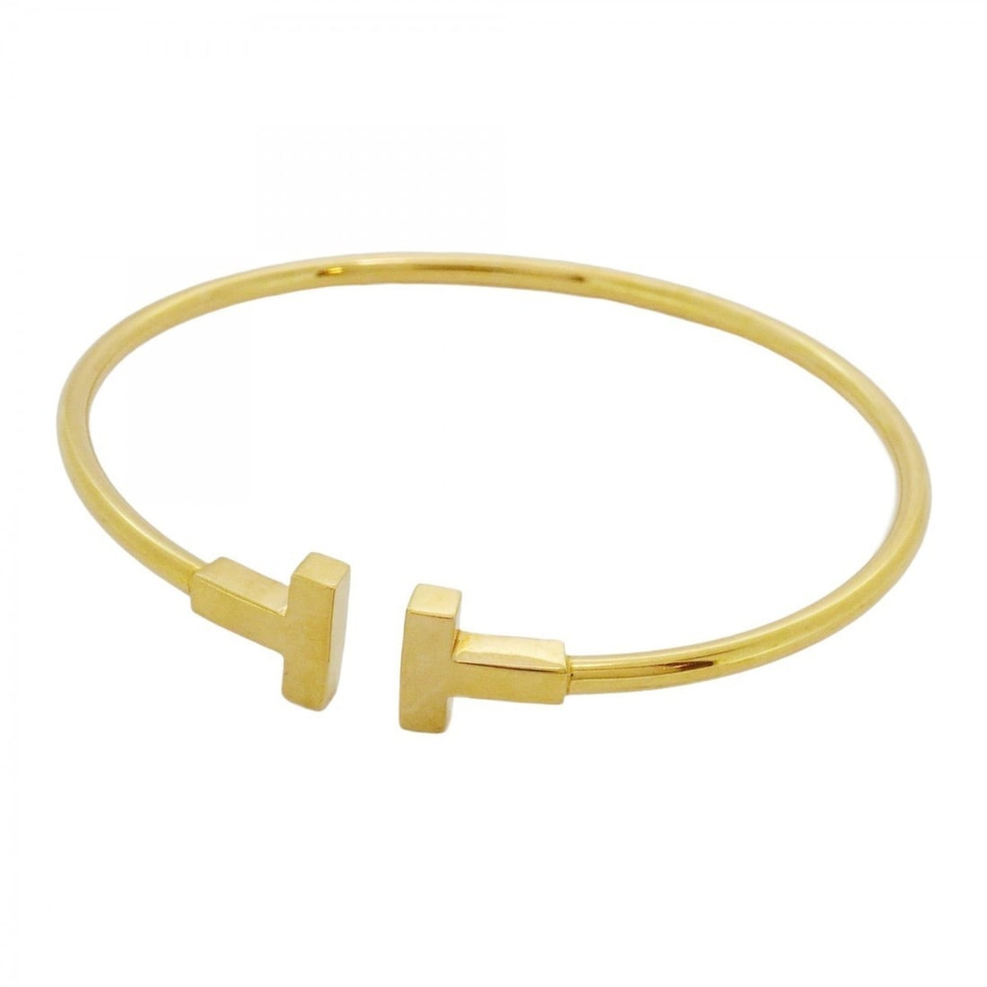 Tiffany Bangle T-Wire 18KYG Yellow Gold Women's: --- Catalog ---Category: SizeLength: 16cm / 6.29''Category: DesignType: BangleGender: WomenMaterial: Yellow gold (18K)Category: GeneralBrand: Tiffany--- Item List ---Section: ConditionRanking: Rank AB
