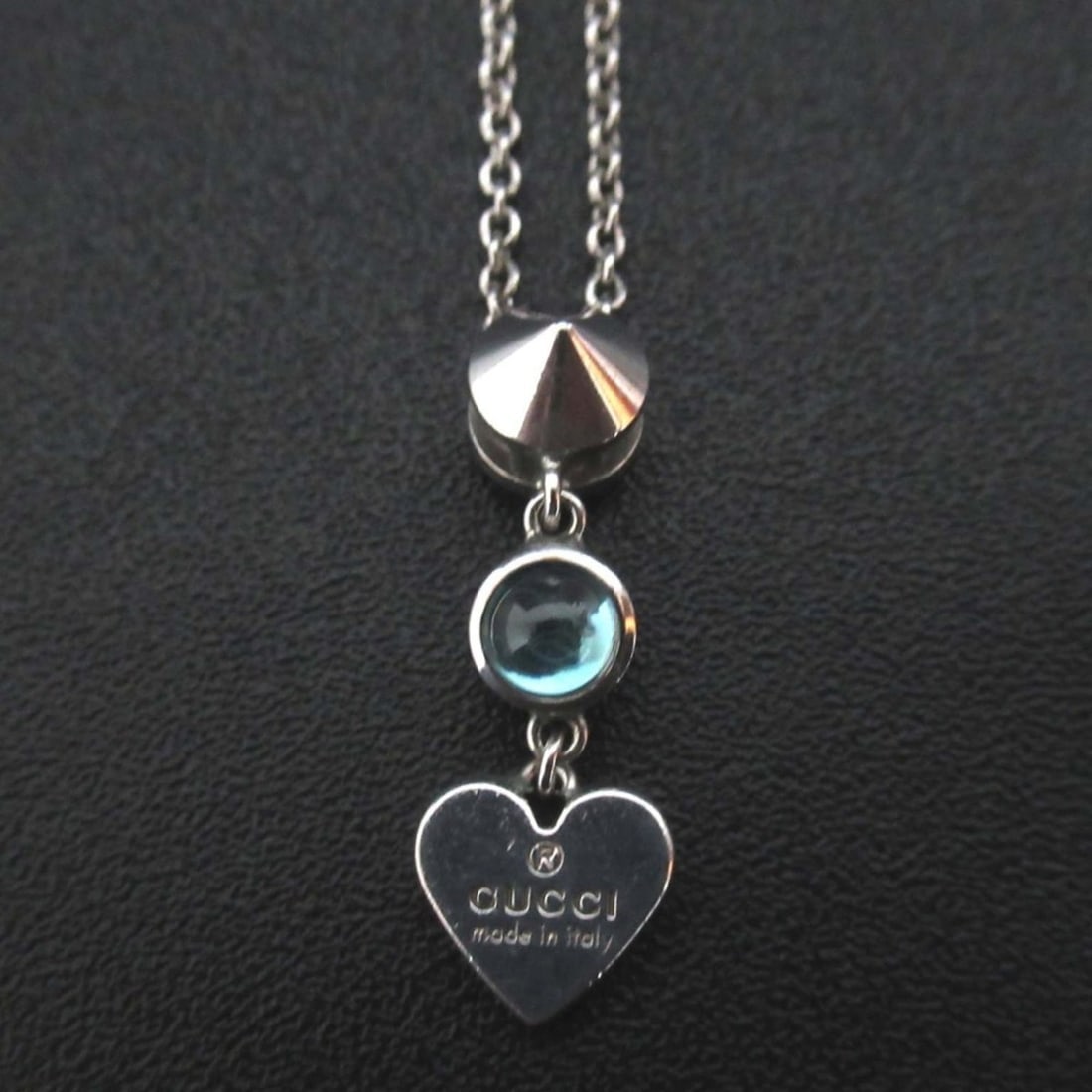 GUCCI Heart Motif Blue Topaz Necklace Pendant in 925SV Silver for Women: --- Catalog ---Category: SizePendant Size: 25mm x 8mm / 0.98'' x 0.31''Neck Circumference: 40.5 cm / 15.94''Category: DesignColor: SilverGender: WomenPendant Type: PendantNecklace Type: NecklaceCatego