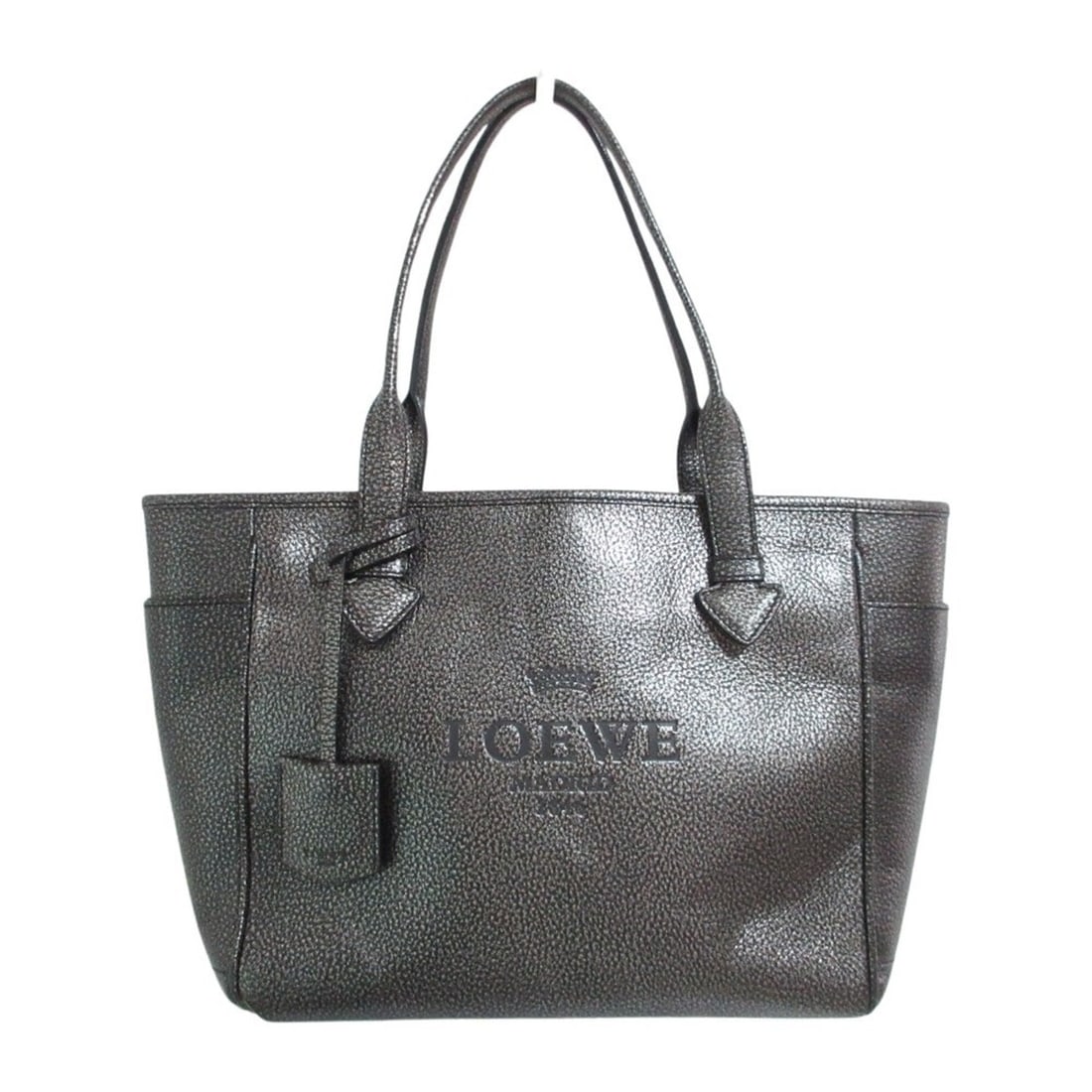 Loewe LOEVE Madrid Heritage Tote Bag in Metallic Coated Leather for Women: --- Catalog ---Category: SizeSize (HxWxD): 24cm x 39cm x 12cm / 9.44'' x 15.35'' x 4.72''Category: DesignType: Handbag, Tote bagColor: Black, Metallic blackGender: WomenCategory: GeneralBrand: Loewe--