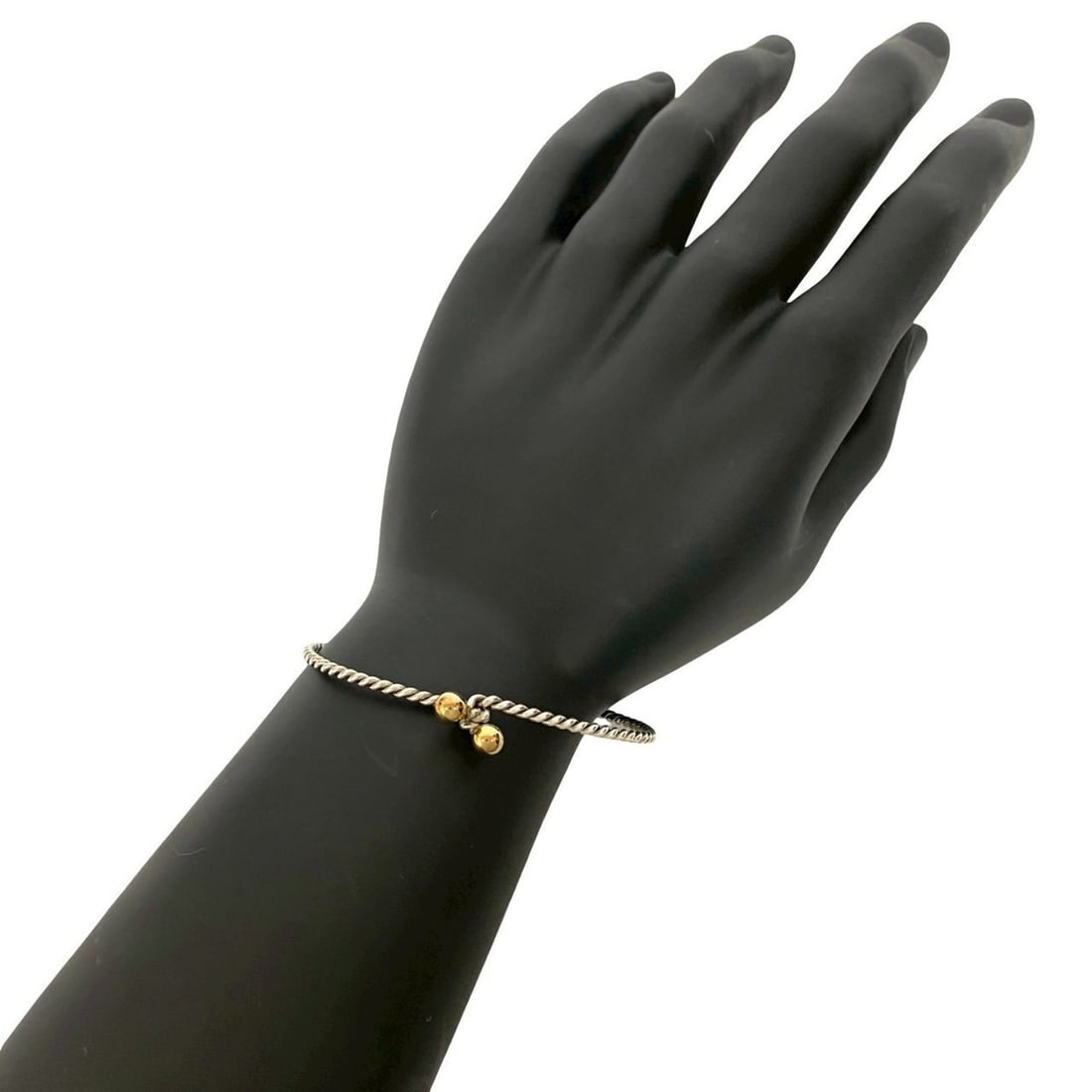 TIFFANY & Co. Tiffany Twist Double Eye Bangle in 925 Sterling Silver and 18K Gold, 29129: --- Catalog ---Category: SizeLength: 17cm / 6.69''Category: DesignType: BangleColor: Gold, SilverGender: WomenMaterial: Gold (18K), Silver 925Category: GeneralBrand: Tiffany--- Item List ---Section: C