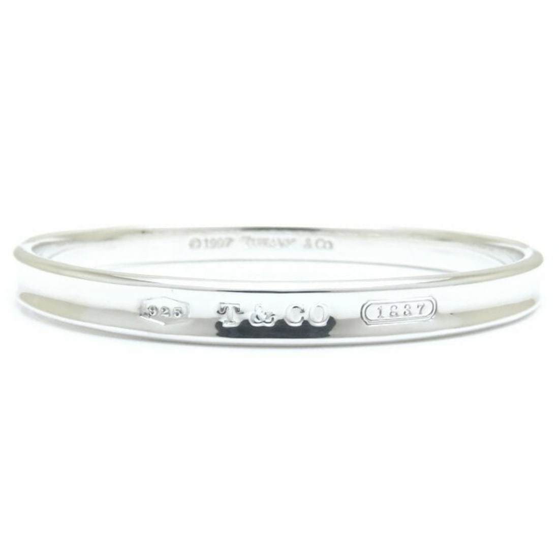 TIFFANY & Co. Tiffany 1837 Narrow Bangle in SV925 for Women, 294735: --- Catalog ---Category: SizeLength: 19.5cm / 7.67''Category: DesignType: BangleGender: WomenMaterial: Silver 925Category: GeneralBrand: Tiffany--- Item List ---Section: ConditionRanking: Rank A Used