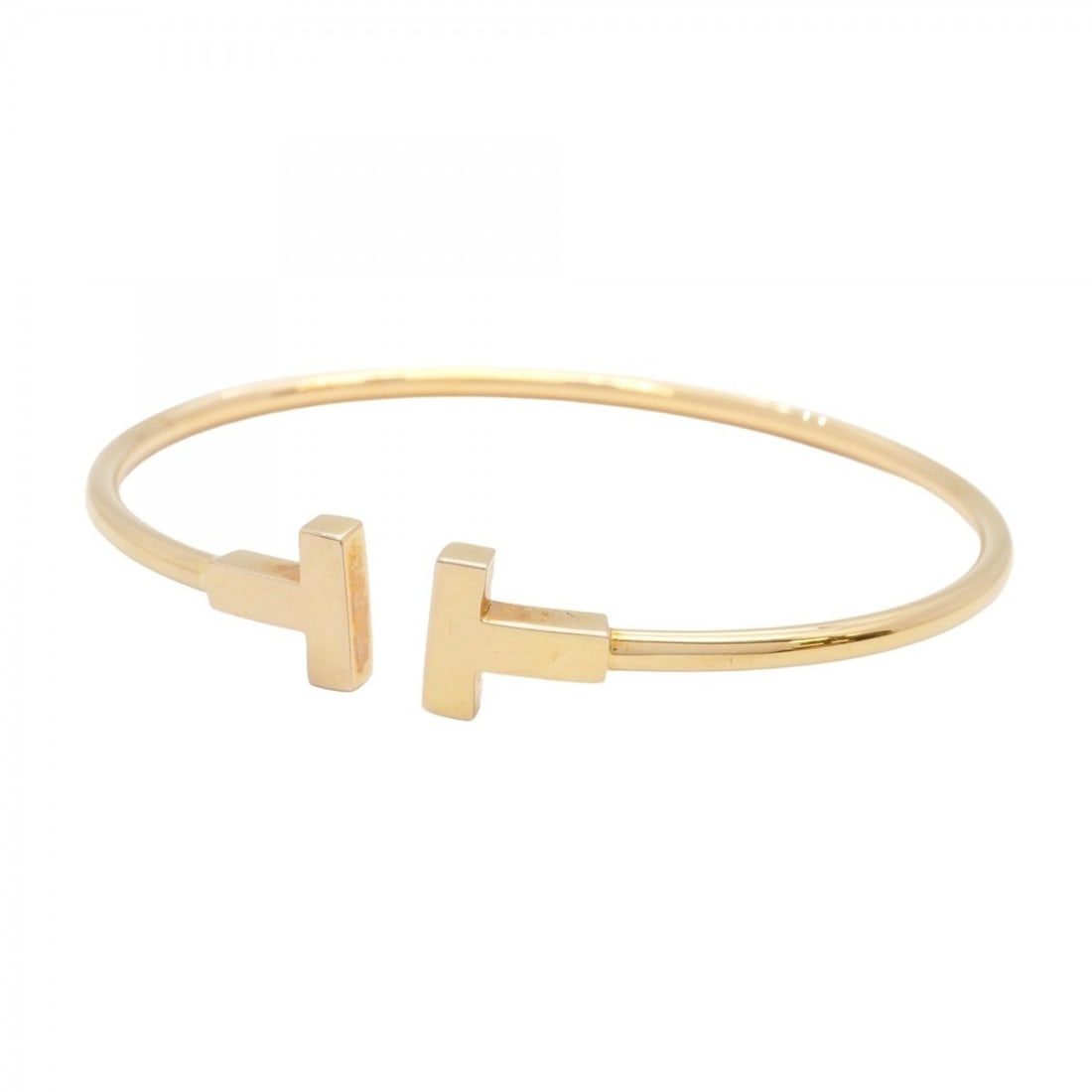 Tiffany Bangle T-Wire 18KPG Pink Gold Women's: --- Catalog ---Category: SizeLength: 16cm / 6.29''Category: DesignType: BangleGender: WomenMaterial: Pink gold (18K)Category: GeneralBrand: Tiffany--- Item List ---Section: ConditionRanking: Rank AB U