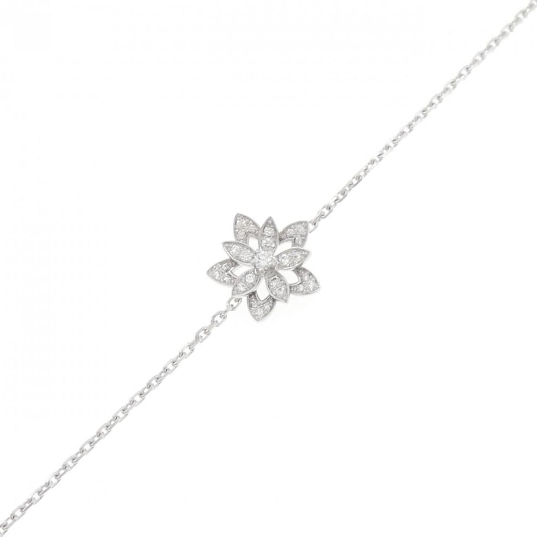 Van Cleef & Arpels Lotus Mini Bracelet: --- Catalog ---Category: SizeLength: 17cm - 18.5cm / 6.69'' - 7.28''Category: DesignType: Charm braceletColor: White goldStone: DiamondGender: WomenMaterial: White gold (18K)Category: GeneralMPN: VCAR
