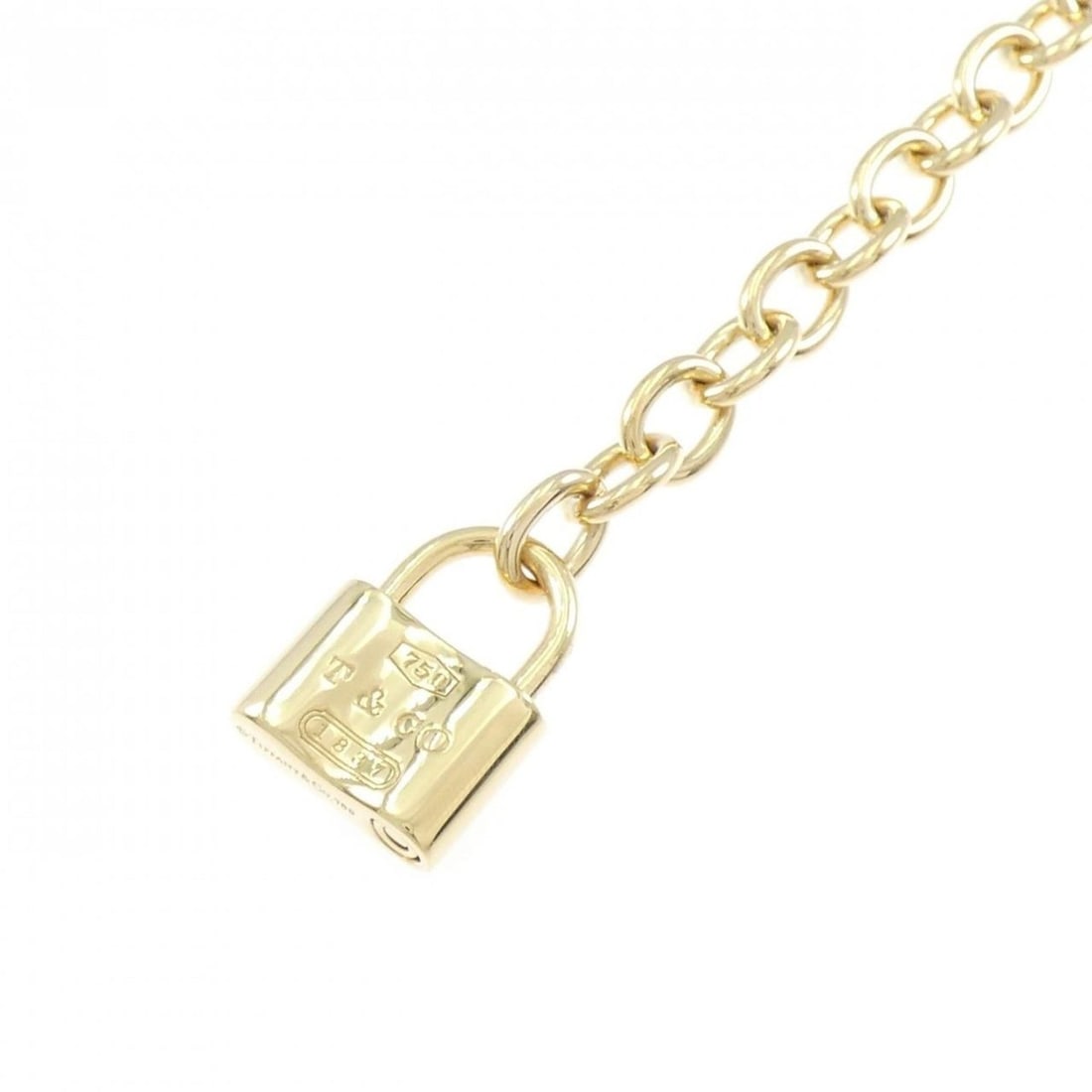Tiffany 1837 bracelet: --- Catalog ---Category: SizeLength: 18cm / 7.08''Category: DesignType: Charm braceletColor: Yellow goldGender: WomenMaterial: Yellow gold (18K)Category: GeneralBrand: Tiffany--- Item List ---Section: