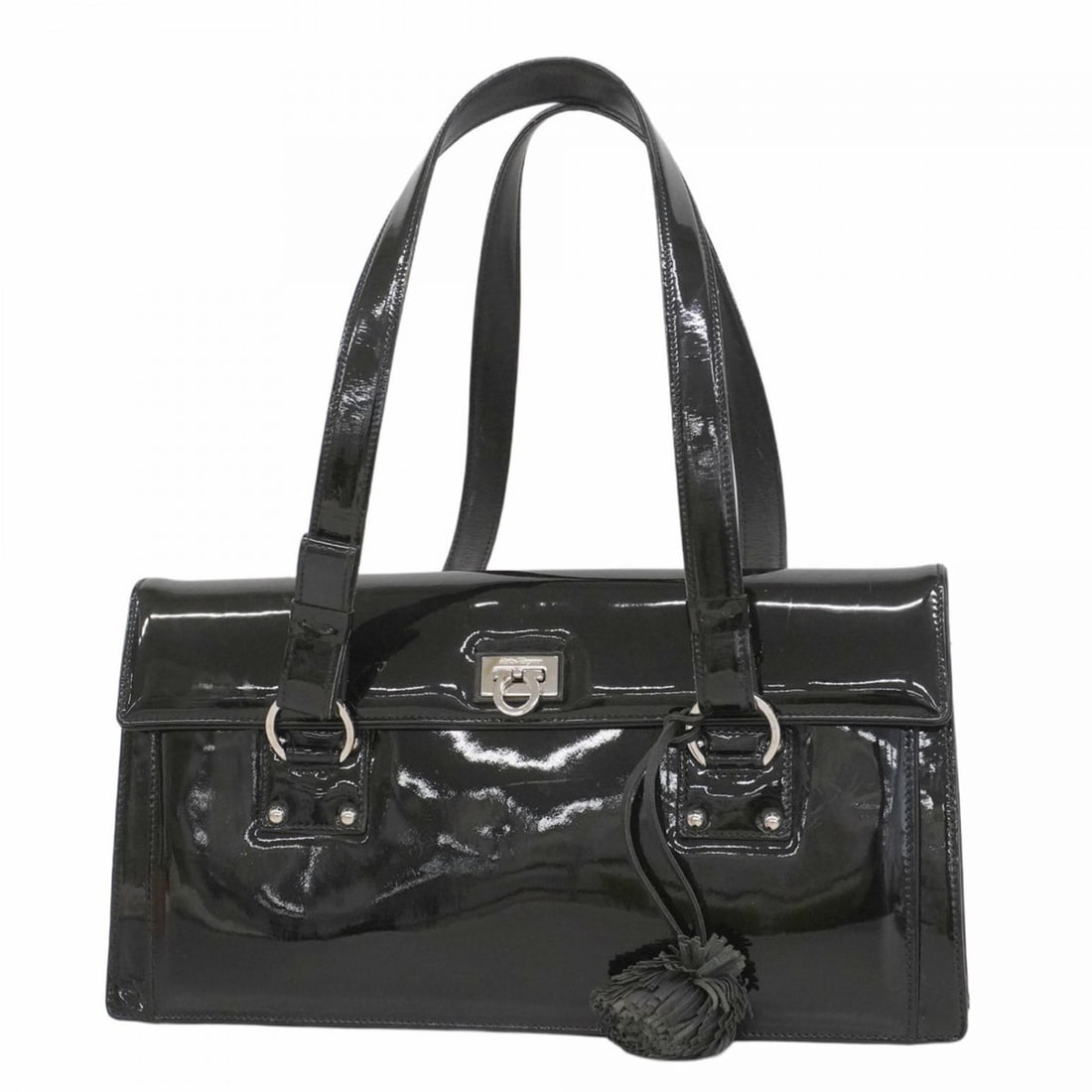Salvatore Ferragamo Gancini handbag in black patent leather for women: --- Catalog ---Category: SizeSize (HxWxD): 18cm x 32.5cm x 6.5cm / 7.08'' x 12.79'' x 2.55''Category: DesignType: HandbagColor: BlackGender: WomenMaterial: Patent leather Hardware Color: SilverCategor