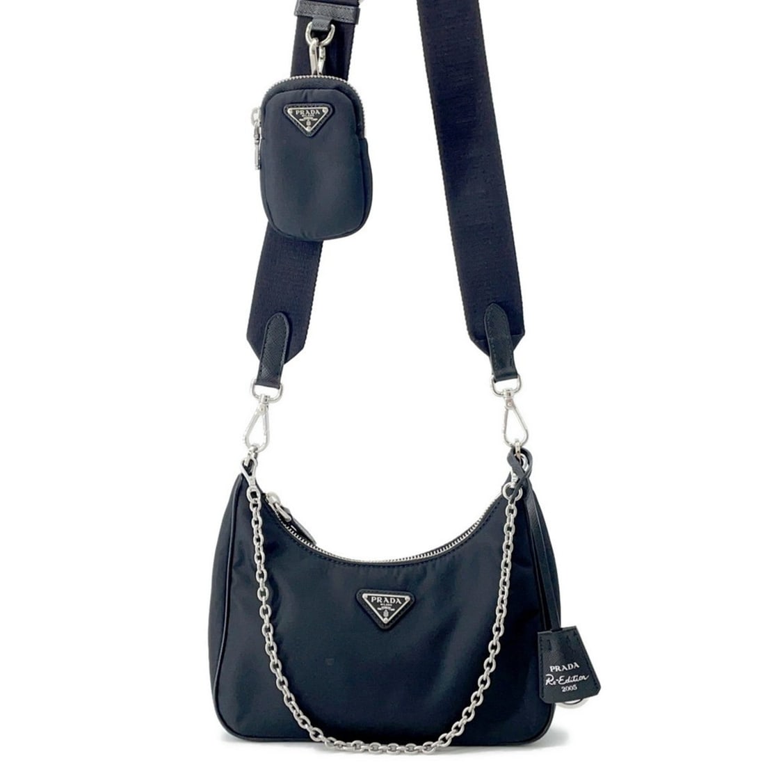 Prada Re-Edition 2005 Re-Nylon Shoulder Bag, 1BH204, Black: --- Catalog ---Category: SizeWeight: 320g / 11.28oz.Size (HxWxD): 12cm x 21.5cm x 6cm / 4.72'' x 8.46'' x 2.36''Strap Length: 78cm - 111cm / 30.7'' - 43.7''Handle Length: 46cm / 18.11''Category: Desig