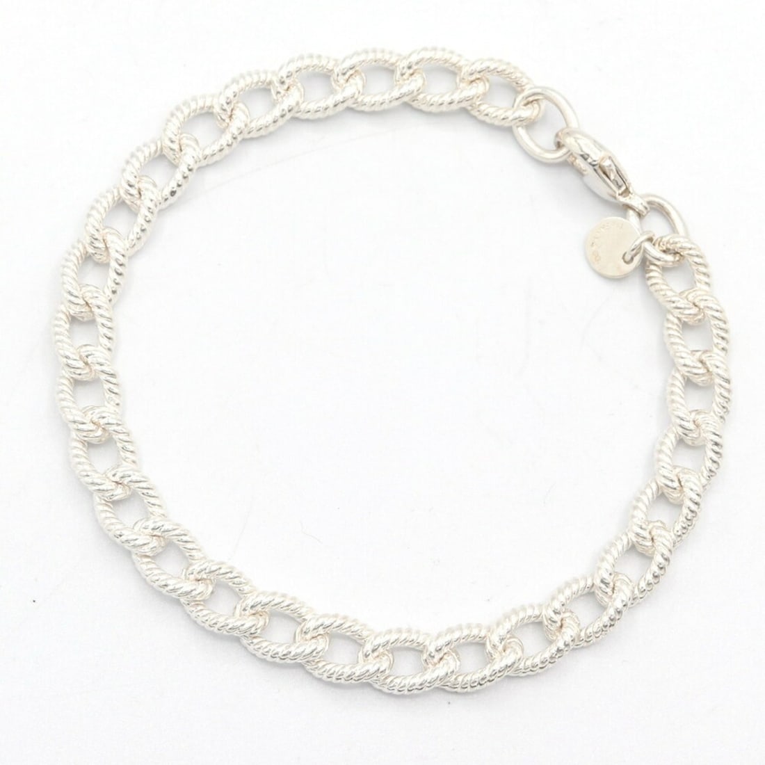 Tiffany & Co. Twisted Rope Chain Bracelet in Sterling Silver (925) for Women.: --- Catalog ---Category: SizeLength: 18.5cm / 7.28''Weight: 19.6g / 0.69oz.Category: DesignType: Charm braceletColor: SilverGender: WomenMaterial: Sterling silver 925Category: GeneralBrand: Tiffany---