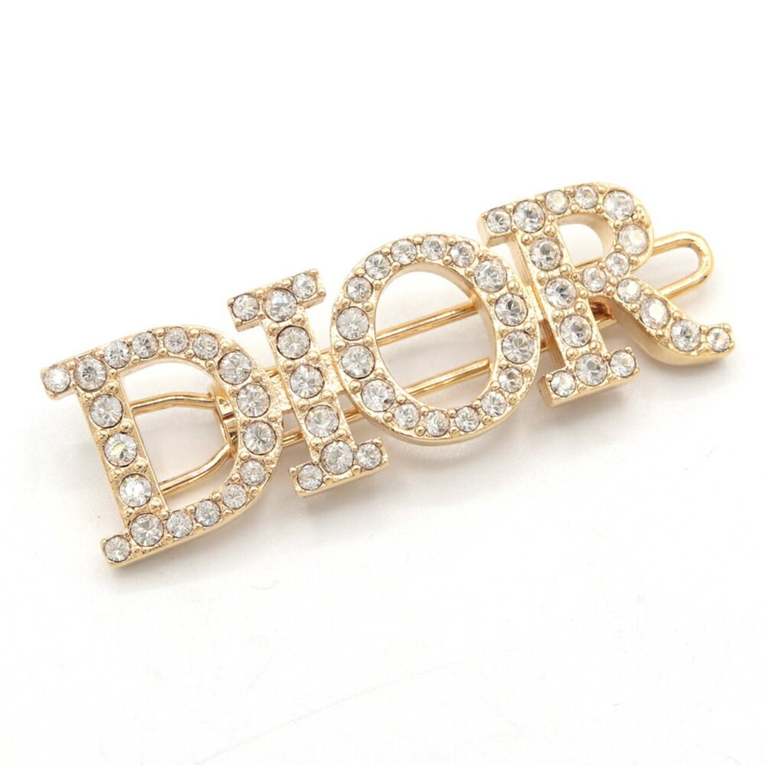 Christian Dior Dior Revolution Hair Clip V0660DVOCY Metal and Crystal Barrette for Women: --- Catalog ---Category: SizeSize (LxW): 4.2cm x 1.3cm / 1.65'' x 0.51''Category: DesignType: Hair clipColor: GoldGender: WomenMaterial: MetalCategory: GeneralMPN: V0660DVOCYBrand: Christian Dior--- I