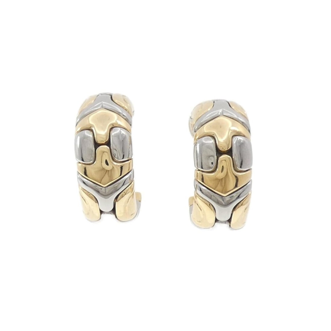 Bvlgari Alveare Earrings: --- Catalog ---Category: SizeSize (HxWxD): 23.10mm x 9.60mm / 0.91'' x 0.38''Category: DesignType: Clip earringsColor: Silver, Yellow goldGender: WomenMaterial: Yellow gold (18K)Category: GeneralBrand