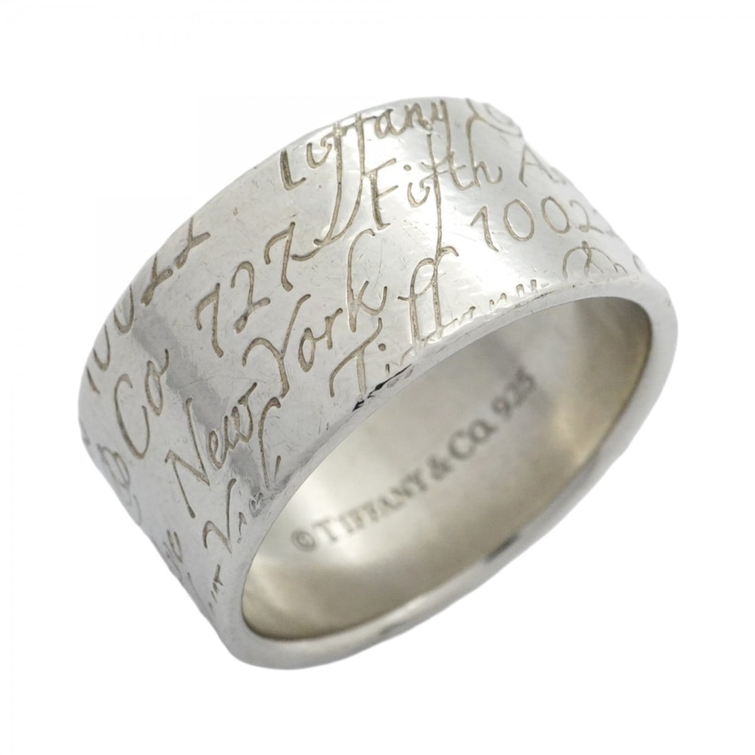 Tiffany Ring Notes Wide Silver 925 Men's Size 16: --- Catalog ---Category: SizeJP Size: 16US Size: 8Category: DesignType: Band ringGender: MenMaterial: Silver 925Category: GeneralBrand: Tiffany--- Item List ---Section: ConditionRanking: Rank AB Used