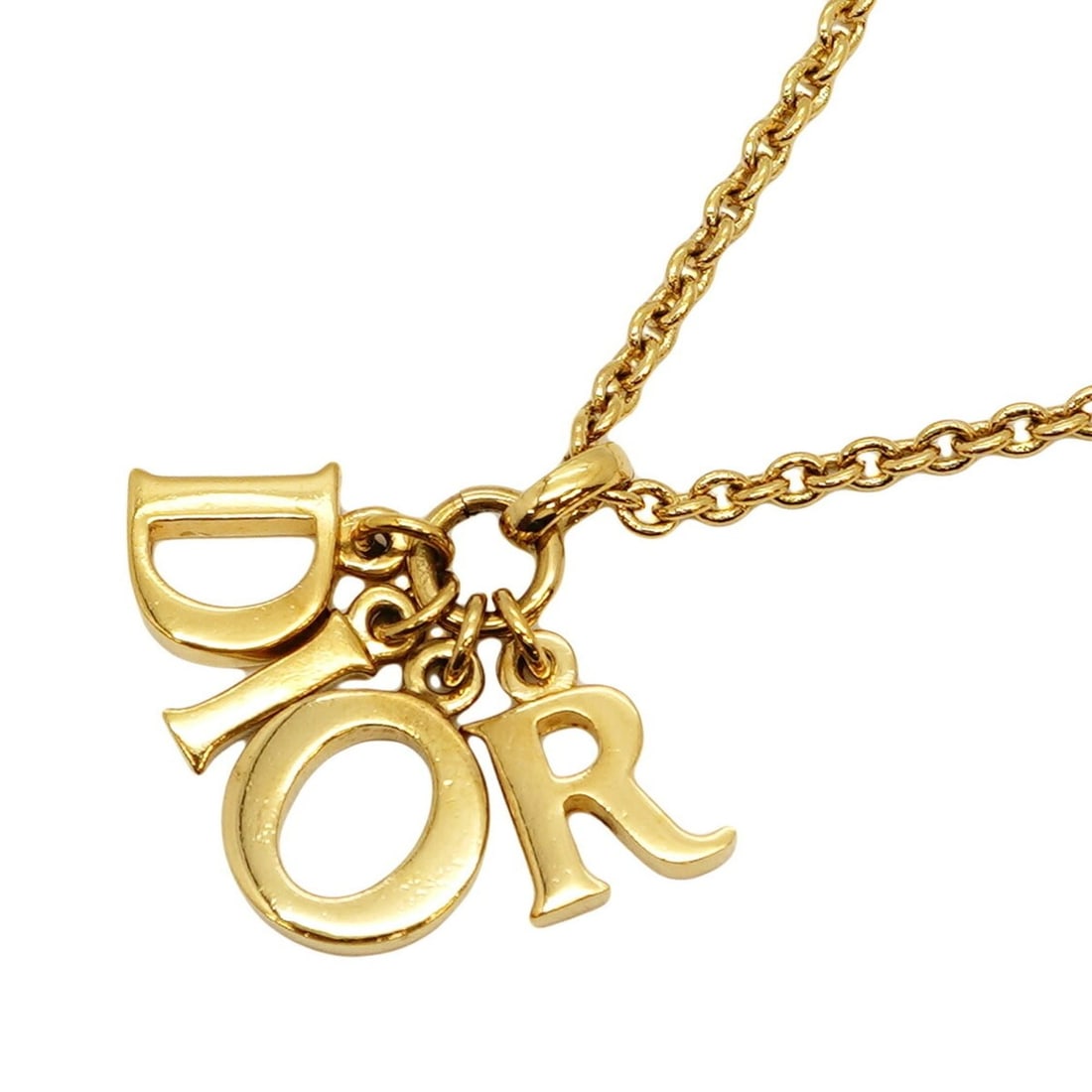 Christian Dior necklace GP plated gold for women: --- Catalog ---Category: SizePendant Size: 32.9mm x 37.8mm / 1.29'' x 1.48''Neck Circumference: 42 cm - 47 cm / 16.53'' - 18.5''Category: DesignColor: GoldGender: WomenMaterial: Gold platingNecklace T