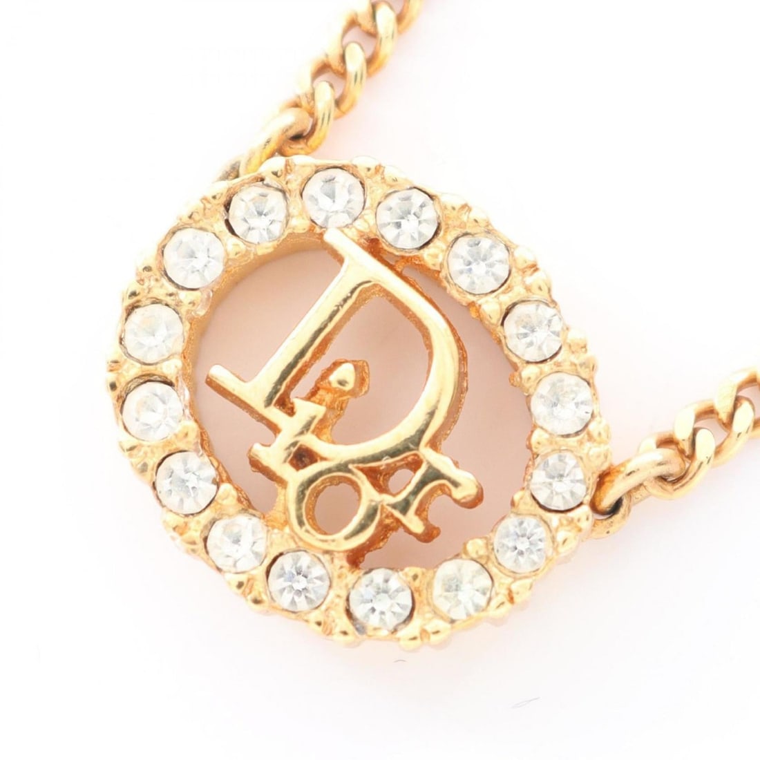 Christian Dior Dior necklace jewelry GP (gold plated) with rhinestones for women, gold and clear: --- Catalog ---Category: SizePendant Size: 13mm x 15mm / 0.51'' x 0.59''Neck Circumference: 34 cm - 39 cm / 13.38'' - 15.35''Category: DesignColor: Clear, GoldGender: WomenMaterial: Gold plating, Rhin