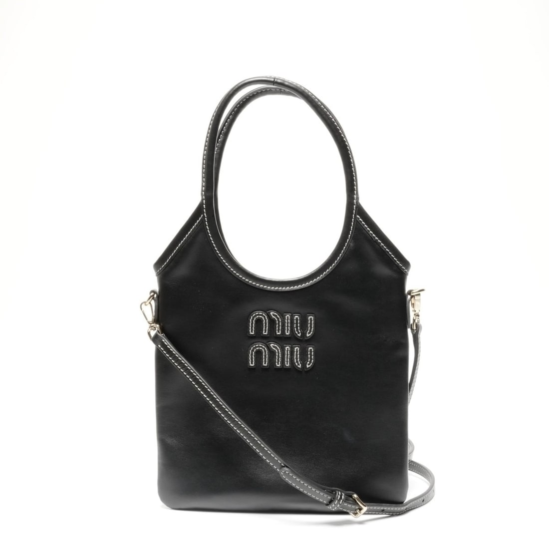 Miu Miu Miu Ivy Leather Mini Handbag in Black: --- Catalog ---Category: SizeStrap Drop: 1.22m / 48.03''Handle Drop: 15.00cm / 5.91''Size (HxWxD): 19cm x 19.5cm x 1cm / 7.48'' x 7.67'' x 0.39''Category: DesignType: HandbagColor: BlackGender: WomenM