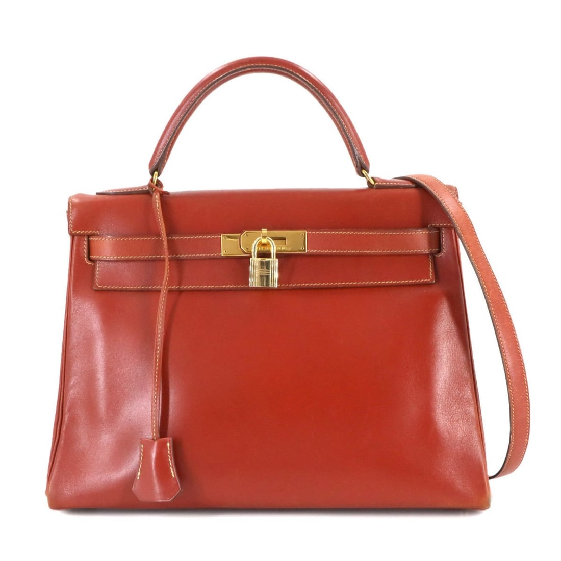 Hermes Hermès Kelly 32 Box Calf Brick 2-Way Hand/Shoulder Bag with Inner Stitching, O-U Stamp, Gold: --- Catalog ---Category: SizeSize (HxWxD): 22.5cm x 31.5cm x 11.5cm / 8.85'' x 12.4'' x 4.52''Category: DesignType: Handbag, Shoulder bagColor: BriqueGender: WomenMaterial: Box calf leather Category: