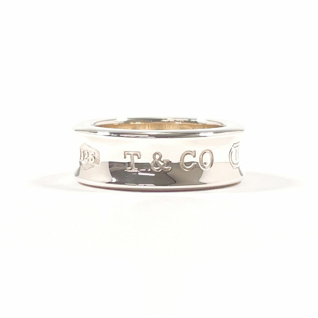 TIFFANY & Co. Tiffany 1837 Medium Ring, 925 Sterling Silver, Size 10, Women's: --- Catalog ---Category: SizeJP Size: 10US Size: 5.5Category: DesignType: Band ringColor: SilverGender: WomenMaterial: Silver 925Category: GeneralBrand: Tiffany--- Item List ---Section: ConditionRanki