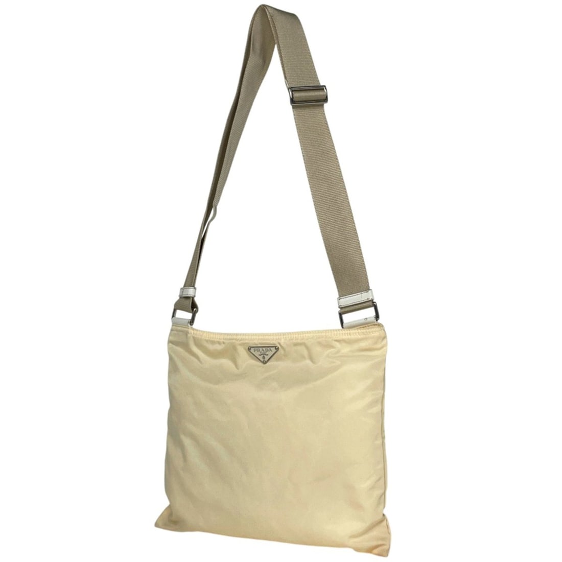 Prada logo plate shoulder bag, crossbody, nylon, ivory, for women: --- Catalog ---Category: SizeSize (HxWxD): 25cm x 29cm x 1cm / 9.84'' x 11.41'' x 0.39''Category: DesignType: Shoulder bagColor: IvoryGender: WomenMaterial: Nylon , Leather Category: GeneralBrand: Pra