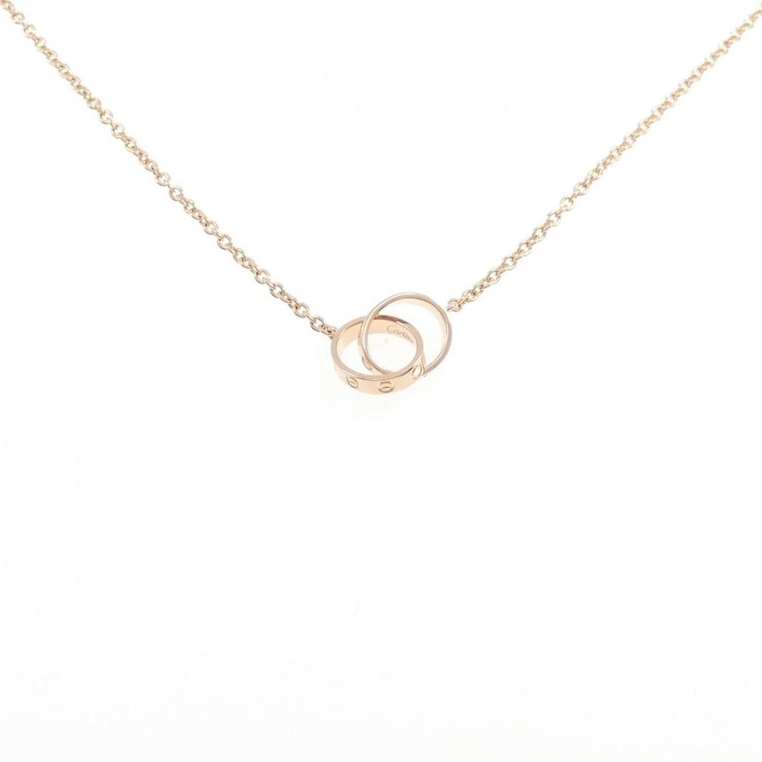 Cartier Baby Love Necklace: --- Catalog ---Category: SizePendant Size: 9.6mm x 9.6mm / 0.37'' x 0.37''Neck Circumference: 45 cm / 17.71''Category: DesignColor: Pink goldGender: WomenMaterial: Pink gold (18K)Necklace Type: Neckla
