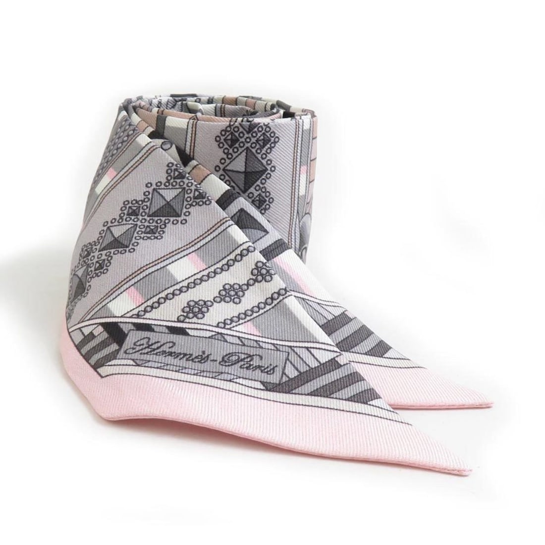 Hermes Hermès Twilly Silk Scarf/Muffler in Pink/Gray for Women (e61161i): --- Catalog ---Category: SizeSize (LxW): 5cm x 85cm / 1.96'' x 33.46''Category: DesignType: ScarfColor: Gray, PinkGender: WomenMaterial: Silk Category: GeneralBrand: HermesCountry of Origin: France---