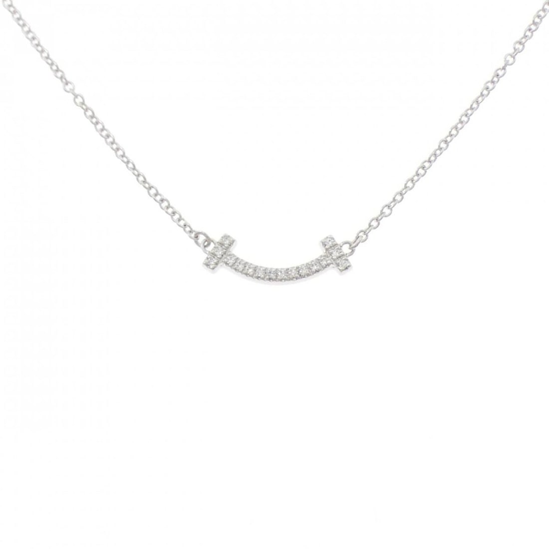 Tiffany T Smile Mini Necklace: --- Catalog ---Category: SizePendant Size: 3.7mm x 13.2mm / 0.14'' x 0.51''Neck Circumference: 41 cm - 45 cm / 16.14'' - 17.71''Category: DesignStone: DiamondGender: WomenMaterial: White gold (18K)Pen