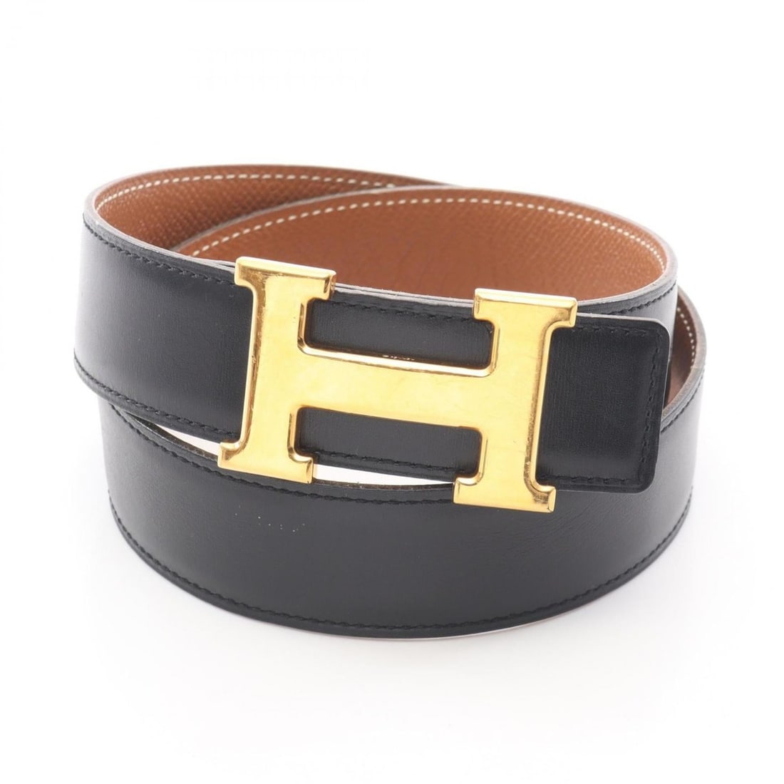 Hermes Hermès Constance H Belt in Noir Gold. This women's belt is made of calfskin leather box calf: --- Catalog ---Category: SizeLength: 66cm - 76cm / 25.98'' - 29.92''Category: DesignType: Standard beltColor: Black, BrownGender: WomenLeather/Fur Type: Box calf leather, Graine couchevel leatherMater