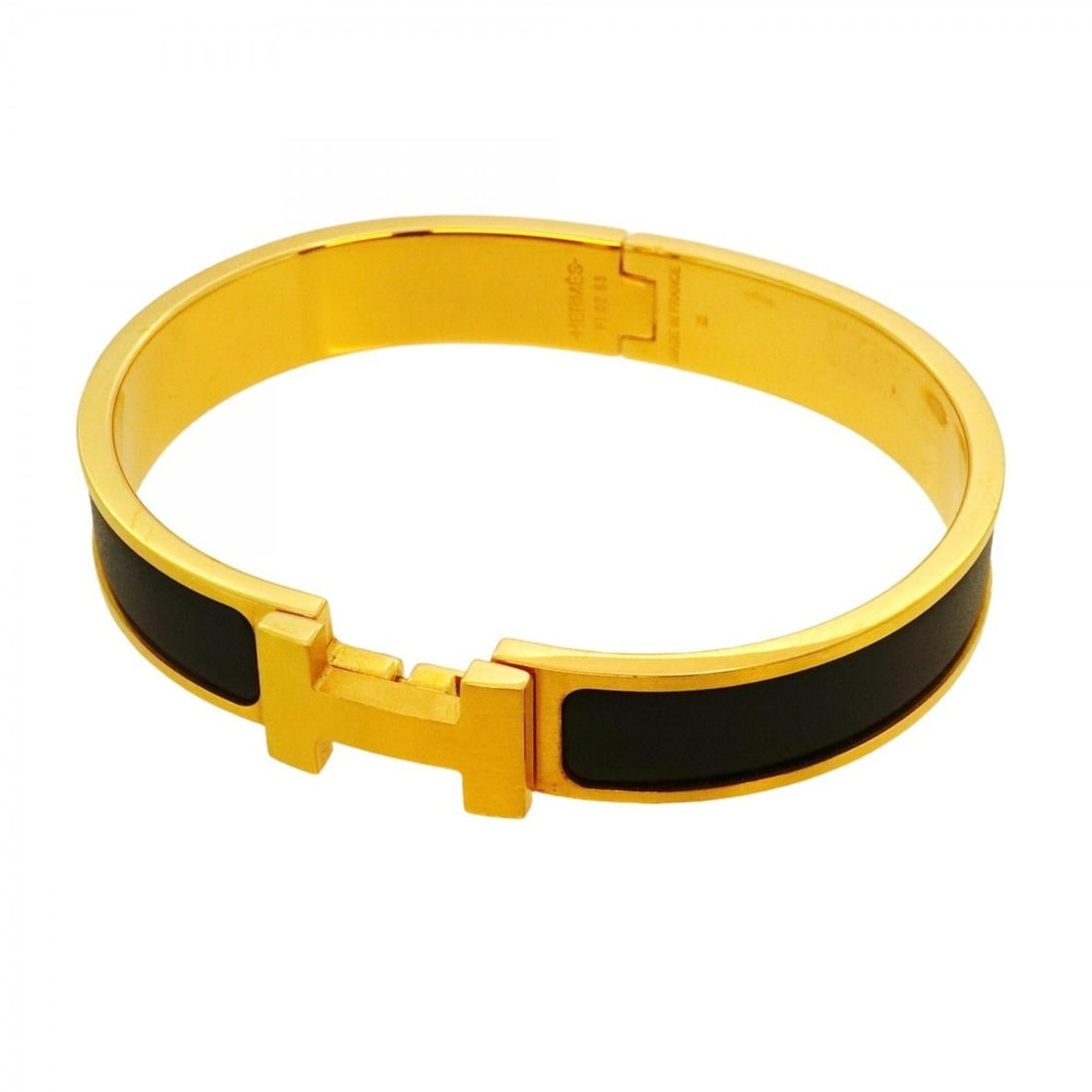 Hermes Click Clack PM Bangle in GP-plated Gold and Black for Men Women: --- Catalog ---Category: SizeLength: 17.5cm / 6.88''Category: DesignType: BangleColor: Black, GoldGender: Men,WomenMaterial: Gold platingCategory: GeneralBrand: Hermes--- Item List ---Section: Conditi
