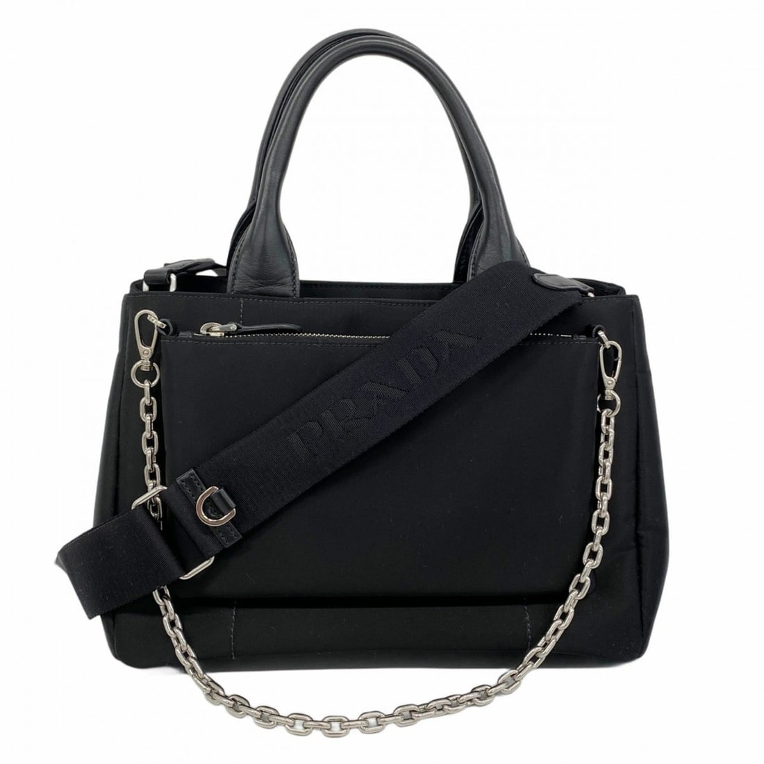 Prada Tessuto Nylon Black 2-Way Handbag for Women, P2032173: --- Catalog ---Category: SizeSize (HxWxD): 19cm x 27cm x 15cm / 7.48'' x 10.62'' x 5.9''Category: DesignType: HandbagColor: BlackGender: WomenMaterial: Nylon Hardware Color: SilverCategory: GeneralBra