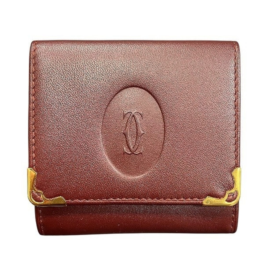 Cartier Must de Coin Purse Women's Wallet: --- Catalog ---Category: SizeSize (HxWxD): 8cm x 8cm x 1.5cm / 3.14'' x 3.14'' x 0.59''Category: DesignType: Coin purse/coin caseColor: BordeauxGender: WomenMaterial: Leather Inner Pocket: Pocket 2Cat