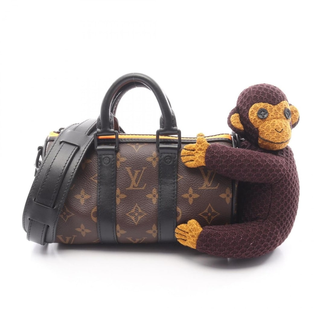 Louis Vuitton Keepall XS Monkey Knit Puppet Handbag, Coated Canvas and Leather, Monogram, LV Friend: --- Catalog ---Category: SizeSize (HxWxD): 12cm x 21.5cm x 9cm / 4.72'' x 8.46'' x 3.54''Category: DesignType: HandbagColor: Brown, Multi-colorGender: MenMaterial: Coated canvas , PVC , Monogram , Lea