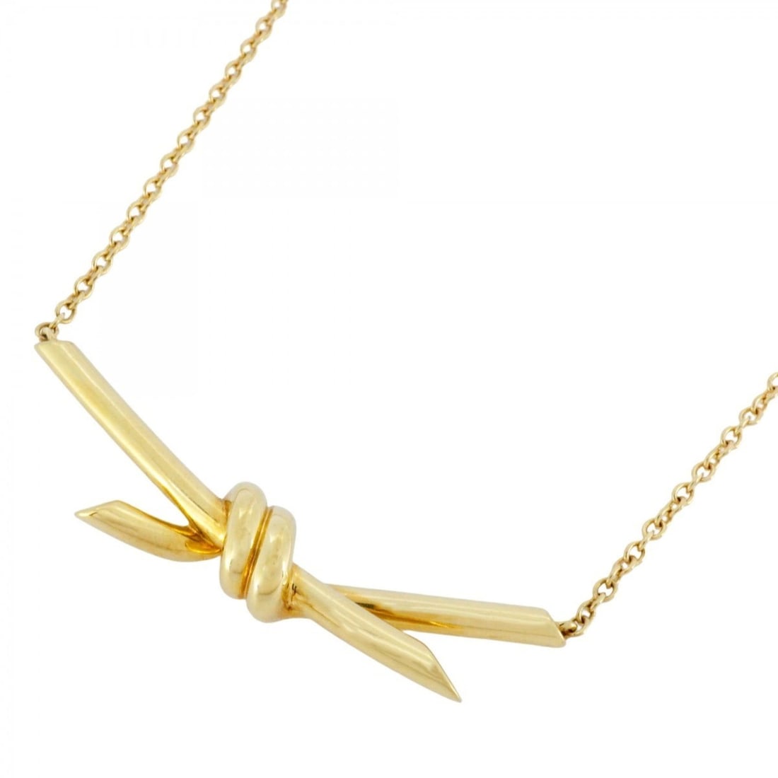 Tiffany Knot Necklace in 18KYG Yellow Gold for Women: --- Catalog ---Category: SizePendant Size: 10mm x 39.4mm / 0.39'' x 1.55''Neck Circumference: 39 cm - 43.5 cm / 15.35'' - 17.12''Category: DesignGender: WomenMaterial: Yellow gold (18K)Necklace Type: