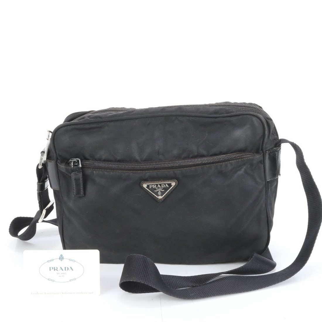 Prada Tessuto Nylon Triangle Logo Leather Shoulder Bag BT0166 Men's: --- Catalog ---Category: SizeSize (HxWxD): 18cm x 26cm x 8cm / 7.08'' x 10.23'' x 3.14''Strap Length: 140cm / 55.11''Category: DesignType: Shoulder bagColor: BlackGender: MenMaterial: Nylon , Leather