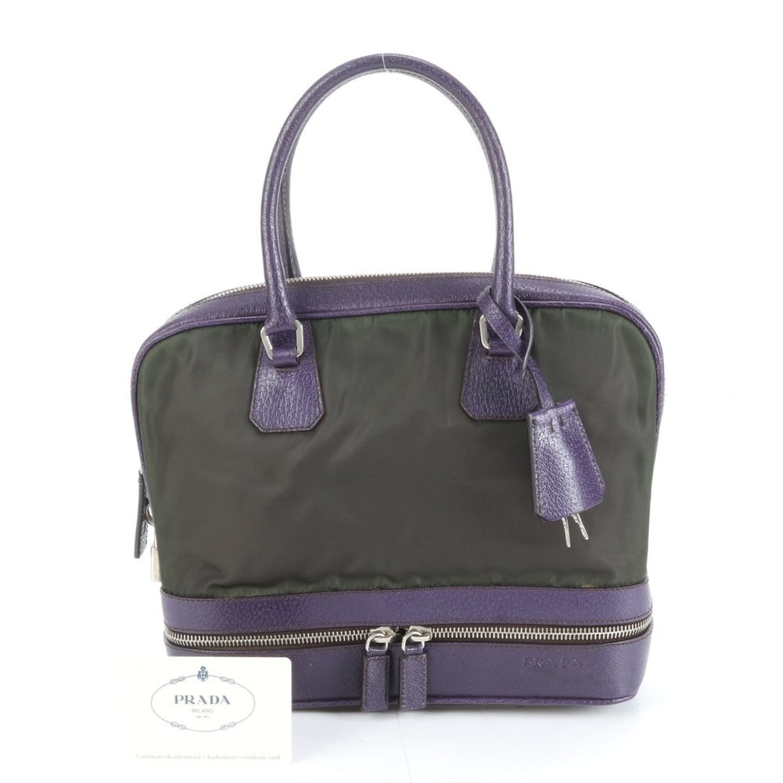 Prada Tessuto Nylon B11228 Leather Handbag Tote with Gold Hardware for Women: --- Catalog ---Category: SizeSize (HxWxD): 20cm x 26cm x 6cm / 7.87'' x 10.23'' x 2.36''Handle Length: 37cm / 14.56''Category: DesignType: HandbagColor: Dark green, PurpleGender: WomenMaterial: Nylon