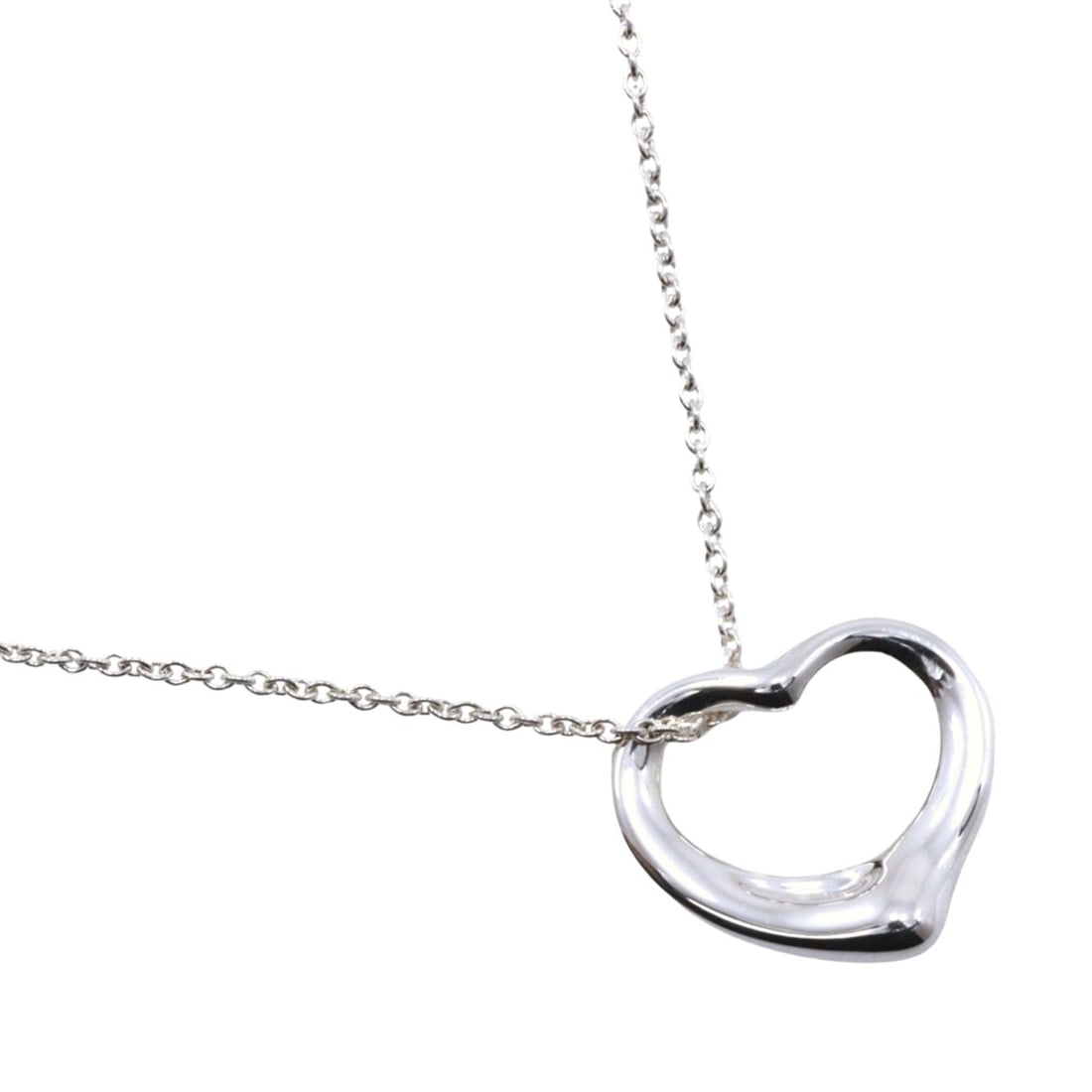 Tiffany & Co. Open Heart Necklace by Elsa Peretti, 925 Sterling Silver, Made in Spain, Approximately: --- Catalog ---Category: SizePendant Size: 15mm x 15mm / 0.59'' x 0.59''Neck Circumference: 40.5 cm / 15.94''Category: DesignColor: SilverGender: WomenMaterial: Silver 925Necklace Type: NecklaceCatego