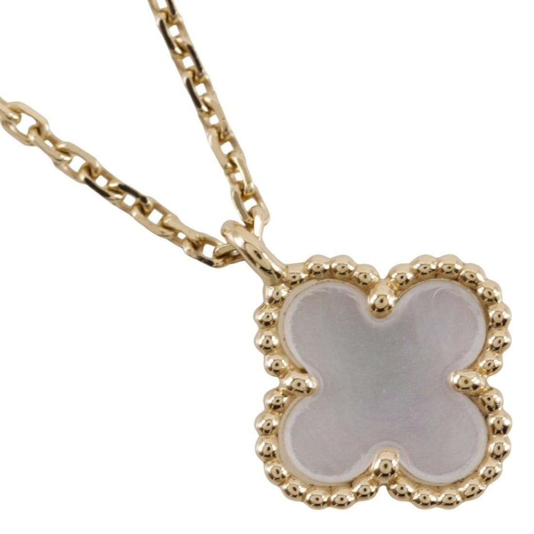 Van Cleef & Arpels Sweet Alhambra Necklace in 18K Yellow Gold with White Shell and Flowers,: --- Catalog ---Category: SizePendant Size: 11.5mm x 9mm / 0.45'' x 0.35''Neck Circumference: 38 cm - 40 cm / 14.96'' - 15.74''Category: DesignColor: Yellow goldGender: WomenMaterial: Shell, Yellow gol