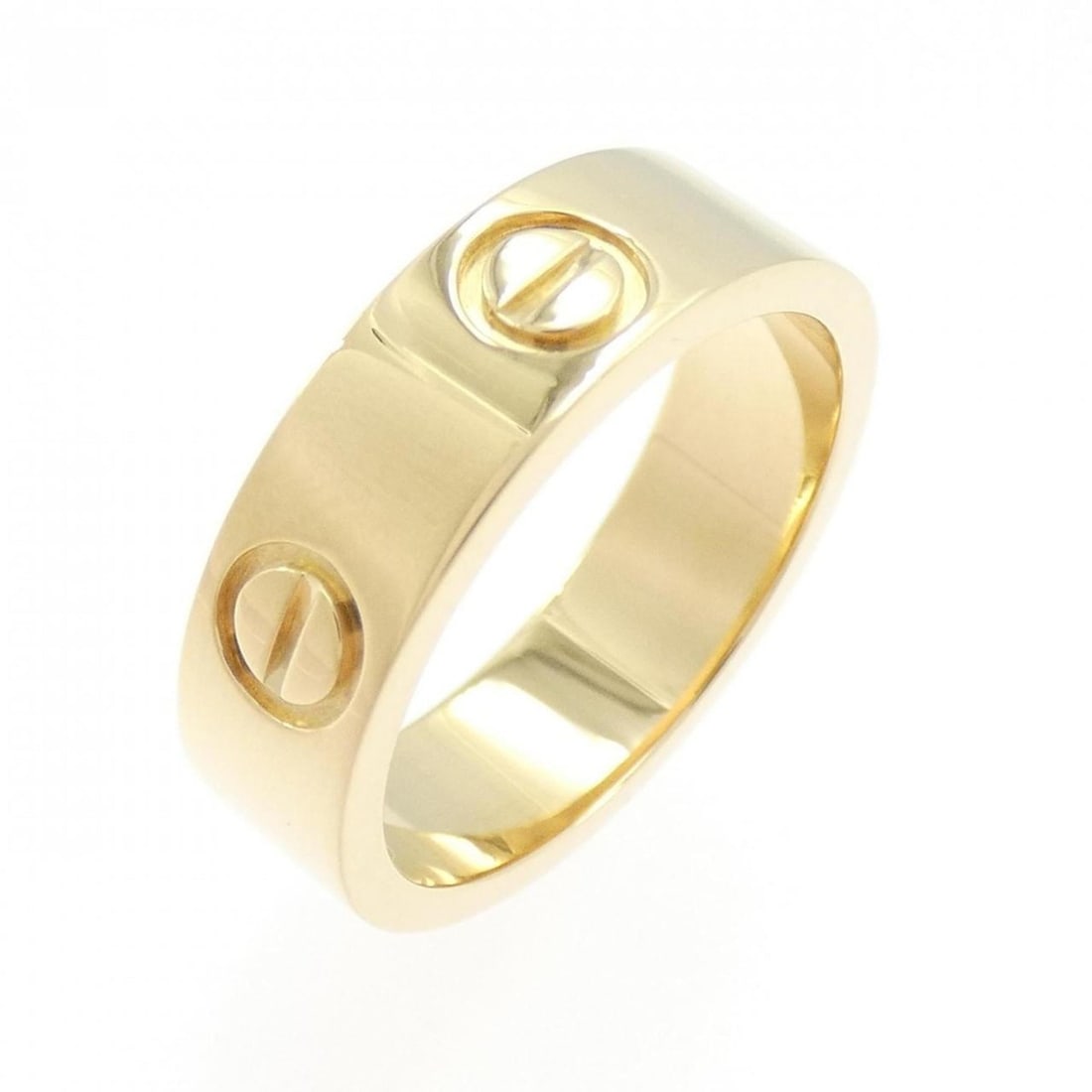 Cartier Love Ring: --- Catalog ---Category: SizeWidth: 5.3mm / 0.21''Weight: 6.2g / 0.21oz.US Size: 5.5Brand Size: 50Category: DesignType: Band ringColor: Yellow goldGender: WomenMaterial: Yellow gold (18K)Metal Purity:
