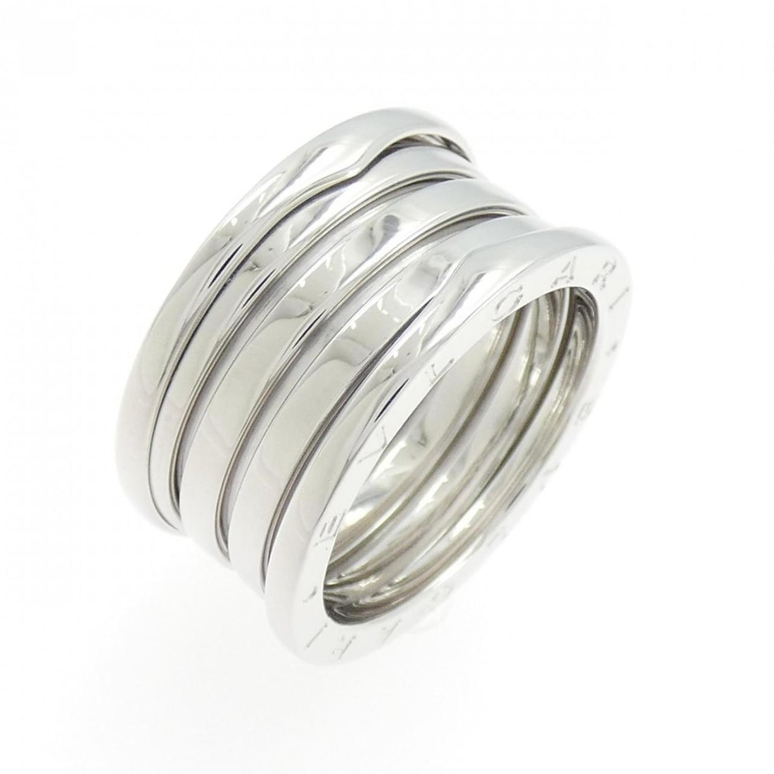 Bvlgari B.zero1 4-Band Ring: --- Catalog ---Category: SizeUS Size: 9Brand Size: 58Category: DesignType: Band ringGender: Women,MenMaterial: White gold (18K)Category: GeneralBrand: Bvlgari--- Item List ---Section: ConditionRanking