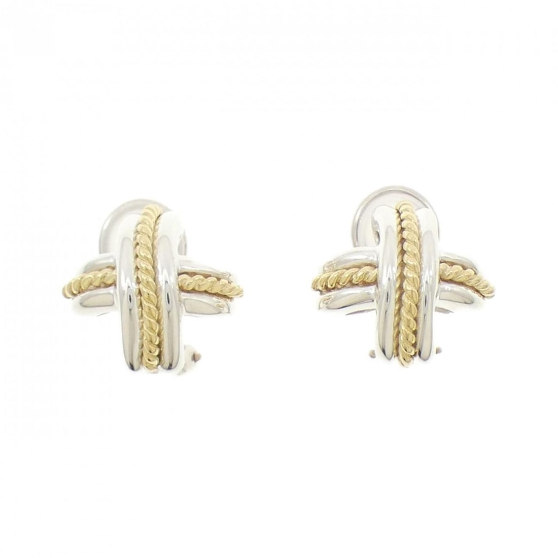 Tiffany Signature Earrings: --- Catalog ---Category: SizeSize (HxWxD): 15.80mm x 16.60mm / 0.62'' x 0.65''Category: DesignType: Clip earringsGender: WomenMaterial: Silver 925, Yellow gold (18K)Category: GeneralBrand: Tiffany---