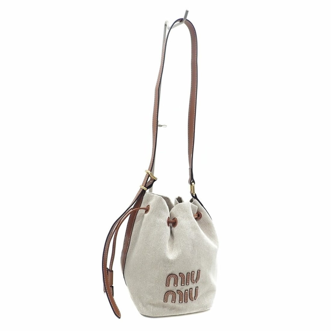 Miu Miu Miu Women's Shoulder Bag, Beige and Brown Canvas Leather, 5BE090 Bucket: --- Catalog ---Category: SizeSize (HxWxD): 21cm x 13.5cm x 16cm / 8.26'' x 5.31'' x 6.29''Category: DesignType: Shoulder bagColor: Beige, BrownGender: WomenMaterial: Canvas , Leather Category: General