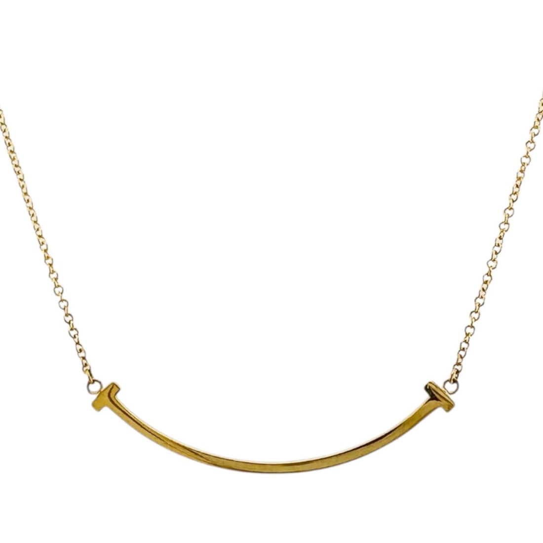 Tiffany T Smile Necklace, 18k Gold, Women's, Pre-owned, TIFFANY & Co.: --- Catalog ---Category: SizePendant Size: 9.5mm x 37.5mm / 0.37'' x 1.47''Neck Circumference: 46 cm / 18.11''Category: DesignColor: GoldGender: WomenMaterial: Yellow gold (18K)Necklace Type: Necklace