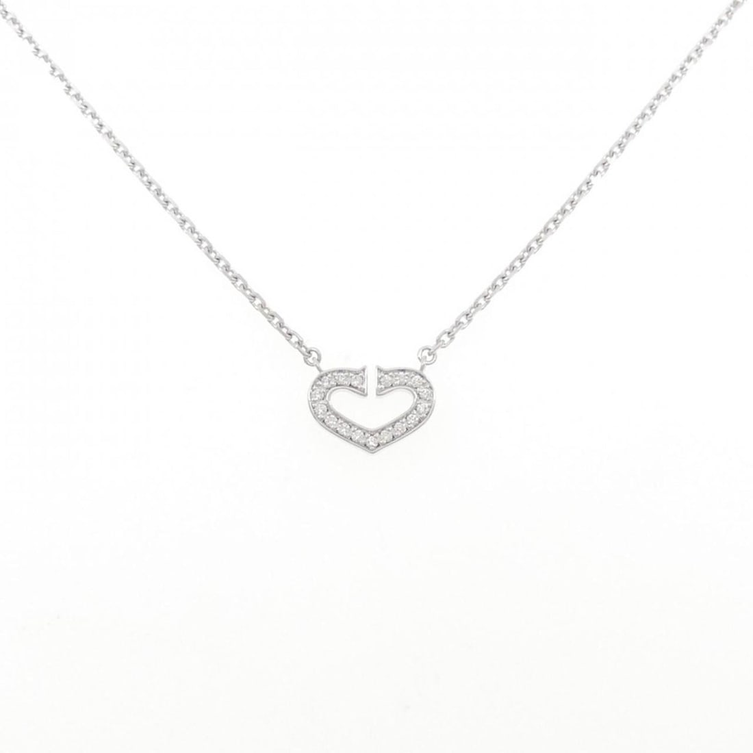 Cartier C Heart Necklace: --- Catalog ---Category: SizePendant Size: 9.1mm x 12.2mm / 0.35'' x 0.48''Neck Circumference: 39 cm / 15.35''Category: DesignStone: DiamondGender: WomenMaterial: White gold (18K)Pendant Type: Pendant