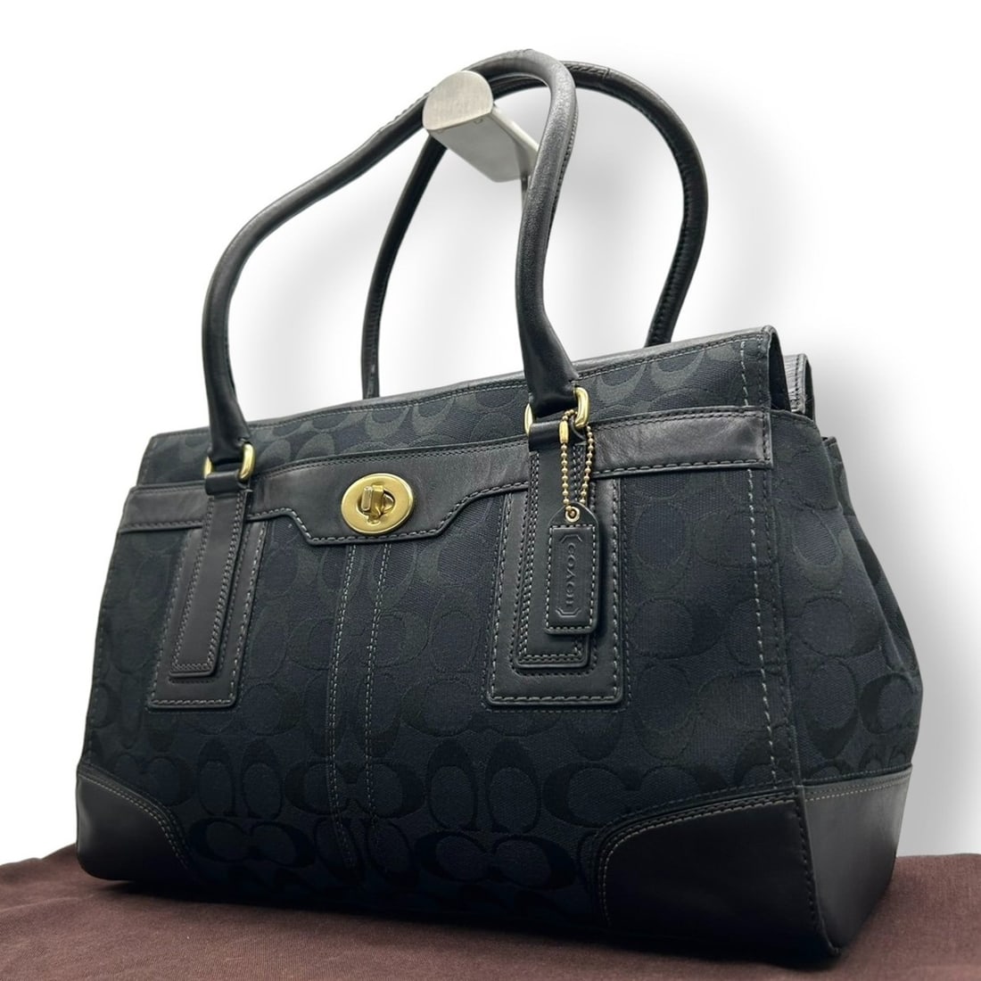 Coach Hamptons Signature Handbag Tote Bag in Canvas and Leather, Black, F11063, Women's, Size 1: --- Catalog ---Category: SizeSize (HxWxD): 24cm x 40cm x 11cm / 9.44'' x 15.74'' x 4.33''Category: DesignType: Handbag, Tote bagColor: BlackGender: WomenMaterial: Canvas , Leather Category: GeneralMPN