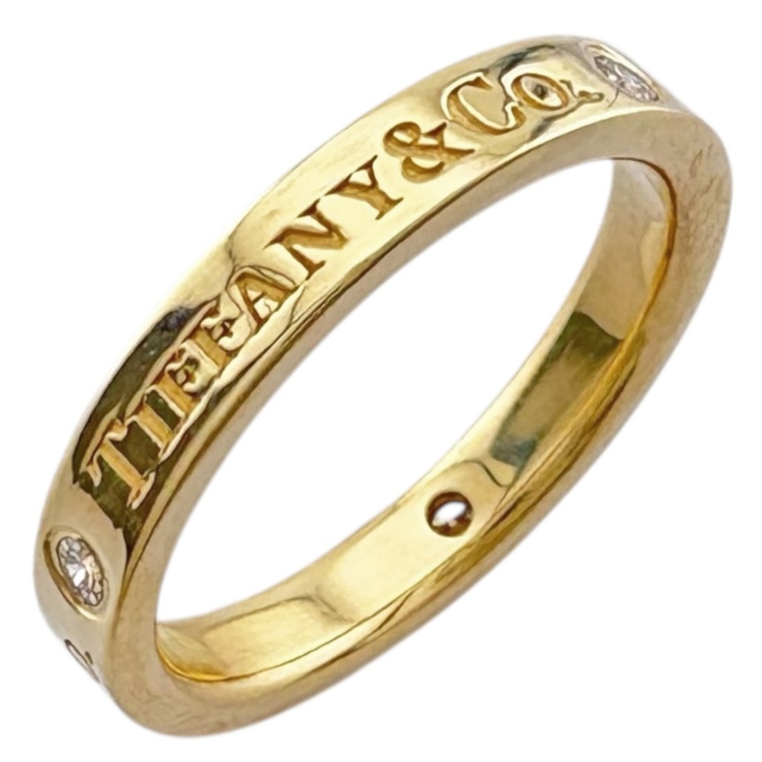 Pre-owned Tiffany & Co. flat band ring, 18k gold with diamonds, for women.: --- Catalog ---Category: SizeJP Size: 7.5US Size: 4Category: DesignType: Band ringGender: WomenMaterial: Yellow gold (18K)Category: GeneralBrand: TiffanyCountry of Origin: USA--- Item List ---Section: