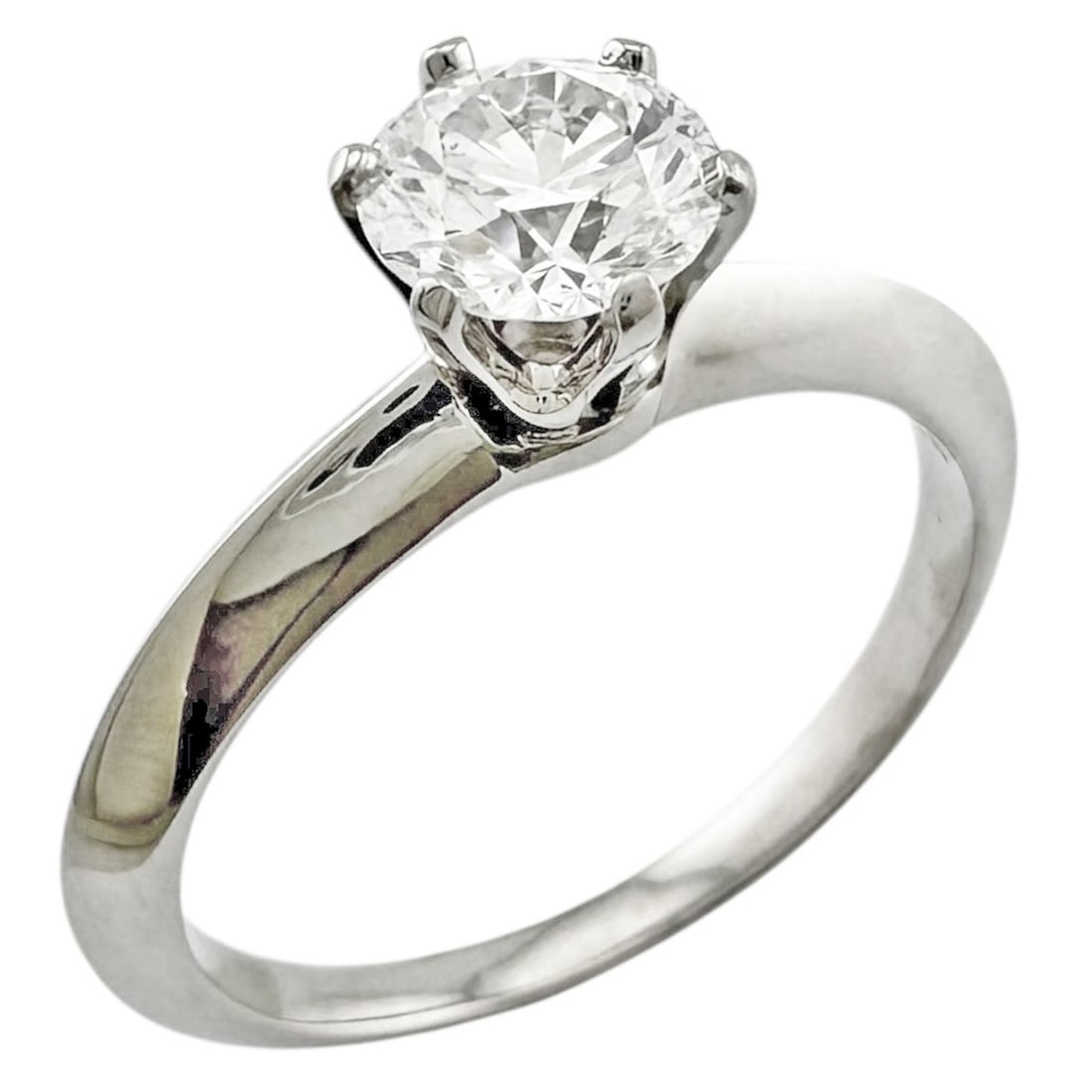 Pre-owned Tiffany & Co. solitaire ring in platinum with diamonds. Women's.: --- Catalog ---Category: SizeJP Size: 13US Size: 6.5Category: DesignType: Band ringGender: WomenMaterial: Platinum 950Category: GeneralBrand: TiffanyCountry of Origin: USA--- Item List ---Section: Con