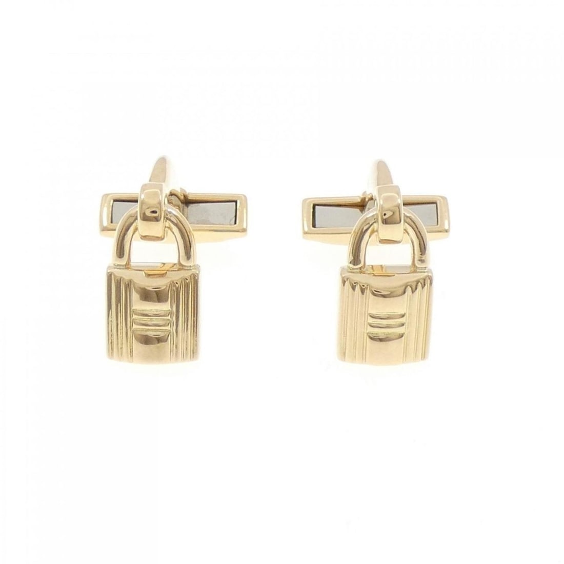 Hermes 750YG Cufflinks: --- Catalog ---Category: SizeSize (HxWxD): 16.10mm x 8.50mm / 0.63'' x 0.33''Category: DesignType: CufflinksColor: Yellow goldGender: WomenMaterial: Yellow gold (18K)Category: GeneralBrand: Hermes---