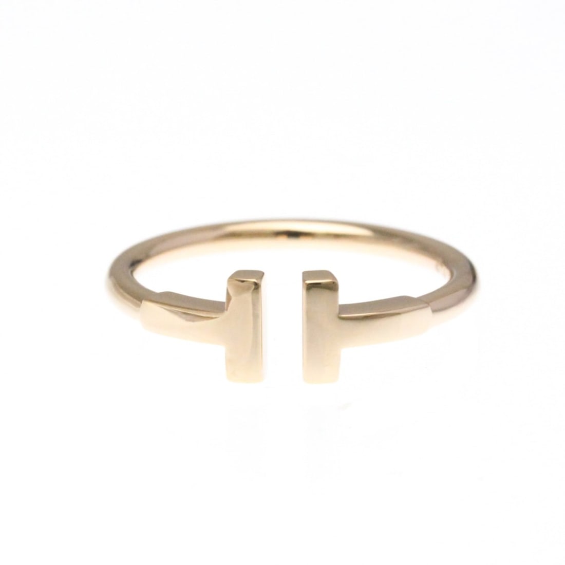 Tiffany T-wire Ring Pink Gold (18K) Fashion No Stone Band Ring Pink Gold: --- Catalog ---Category: SizeWidth: 1.8mm / 0.07''Weight: 3.1g / 0.1oz.JP Size: 13US Size: 6.5Category: DesignType: Band ringColor: Pink goldMetal: GoldStone: No StoneStyle: FashionGender: Men,WomenMa