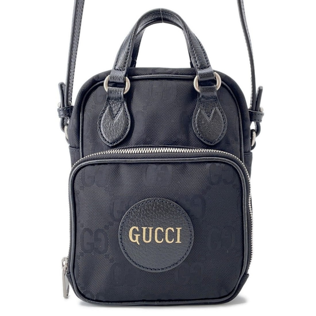 Gucci Off the Grid Shoulder Bag in GG Nylon (625850) - Black. This 2-way handbag is available black.: --- Catalog ---Category: SizeSize (HxWxD): 21cm x 16cm x 8cm / 8.26'' x 6.29'' x 3.14''Category: DesignType: Handbag, Shoulder bagColor: BlackGender: Men,WomenMaterial: Nylon , Leather Category: Gener